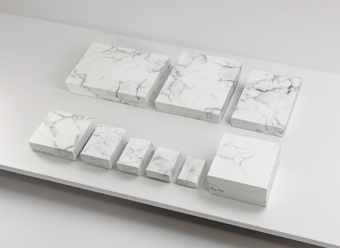 1 15/16" x 1 1/4" x 11/16" Marble White Cotton Filled Paper Box