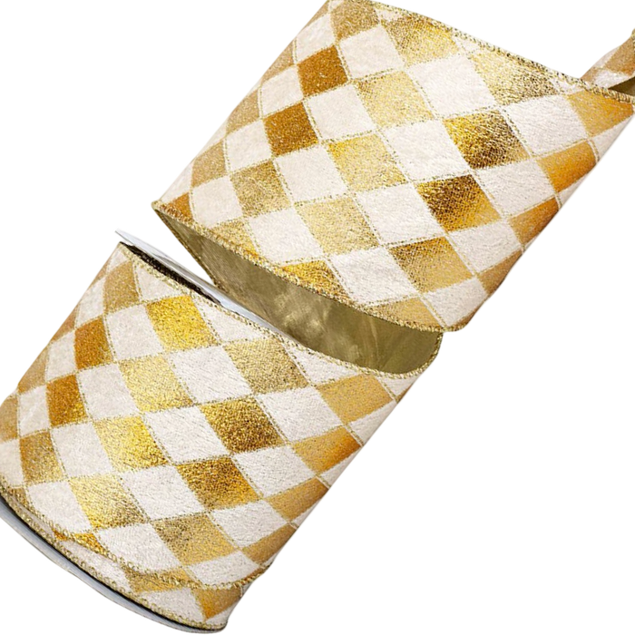 Four-inch velvet ribbon with alternating gold and ivory harlequin diamonds, arranged in loose loops beside a spool on a white background.