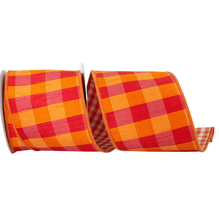 Orange and fuchsia dupioni check wired ribbon, 4 inches wide, shown in loose loops for statement bows, Christmas trees, wreaths, garlands, and gift wrapping.