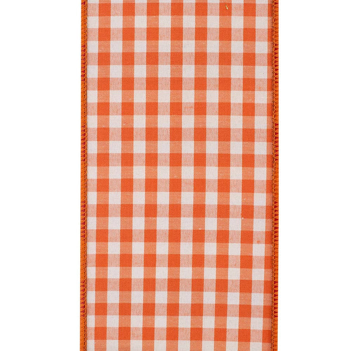 A close-up of a woven textile with an orange and white gingham check pattern and a solid orange border.