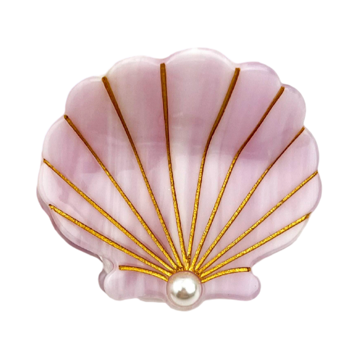 A pink clam shell-shaped brooch with gold metallic rays and a central white pearl, shown on a plain white background.